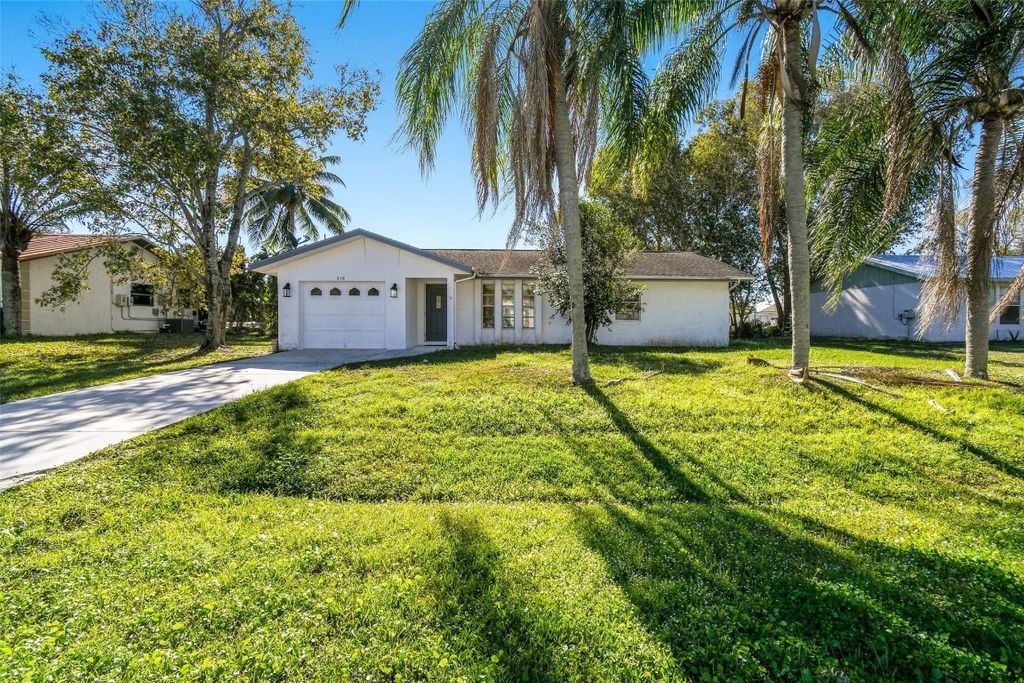 Photo of 516 SW Buswell Avenue, Port Saint Lucie, FL 34983 (MLS # F10543902)