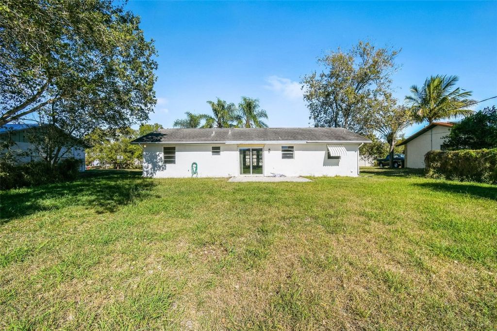 Photo of 516 SW Buswell Avenue, Port Saint Lucie, FL 34983 (MLS # F10543902)