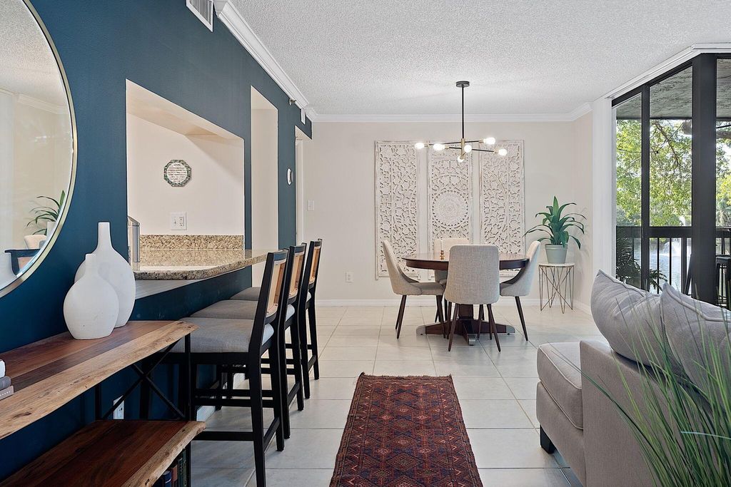 Photo of 950 Lavers Circle #Apt F-205, Delray Beach, FL 33444 (MLS # R10972174)