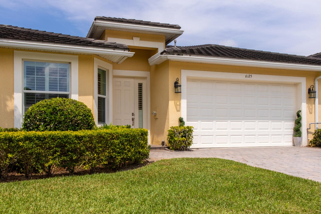 Photo of 6125 NW Wick Lane, Port Saint Lucie, FL 34983 (MLS # B26058955)