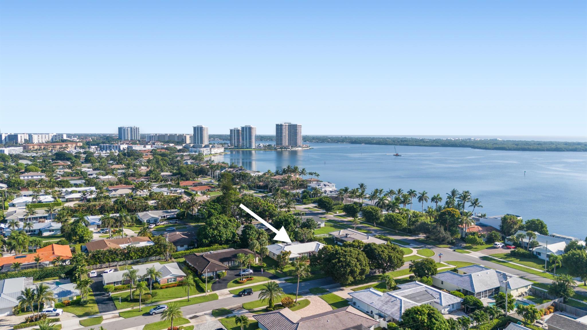 Absolutely darling single-story 3-bedroom, 3-full bathroom home in highly sought-after North Palm Beach. Enjoy a spacious covered + screened patio, and a fenced backyard, perfect for entertaining. Split floor plan for extra privacy, ample windows and natural light throughout. Great school district, walking distance to waterfront Lakeside Park with playground, beach, basketball, and tiki gazebo. Minutes to Anchorage Park with boat ramp. North Palm Beach Country Club with golf, dining and swimming pool. You will feel right at home! Call today for more information.