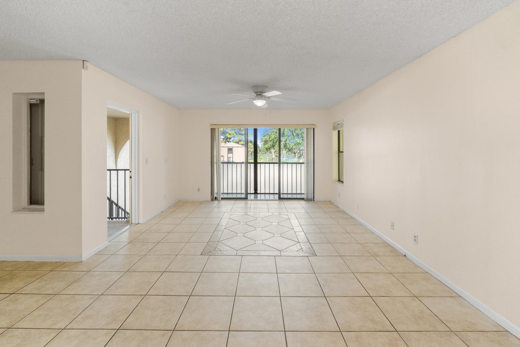 Photo of 706 Sunny Pine Way #E2, Greenacres, FL 33415 (MLS # B26071914)