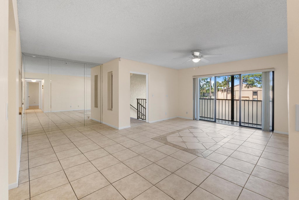 Photo of 706 Sunny Pine Way #E2, Greenacres, FL 33415 (MLS # B26071914)