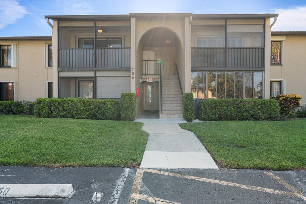 Photo of 706 Sunny Pine Way #E2, Greenacres, FL 33415 (MLS # B26071914)
