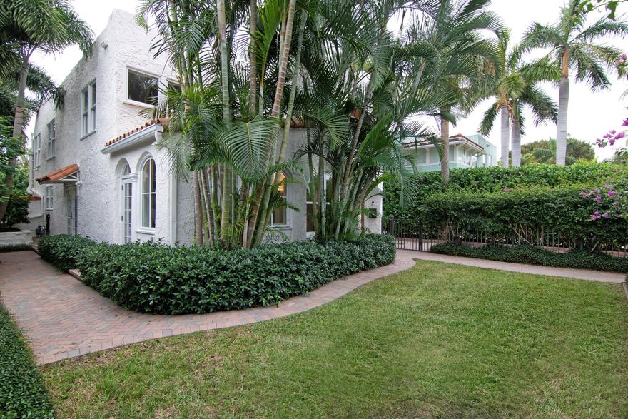 Welcome home to this beautifully renovated Mission Style three bedroom, three bath + 1/1 legal rental guest house. Located on a beautiful tree lined street a block and a half from the intracoastal in prestigious El Cid. Features include an amazing interior two story atrium, full hurricane impact doors and windows, whole house generator, working fireplace, well scaled rooms including bedrooms with ample storage, and an oversize primary bedroom with large bathroom. Enjoy your morning coffee on the private deck of the bedroom overlooking the private pool.  Newer central A/C and heating. Oversize eat in kitchen with recently updated appliances, lots of custom cabinetry, and a closed off laundry area.  Recently painted both inside and out with neutral tones .