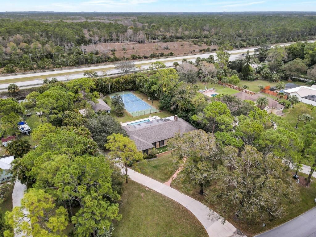 Photo of 10466 Trailwood Circle, Jupiter, FL 33478 (MLS # R11050640)