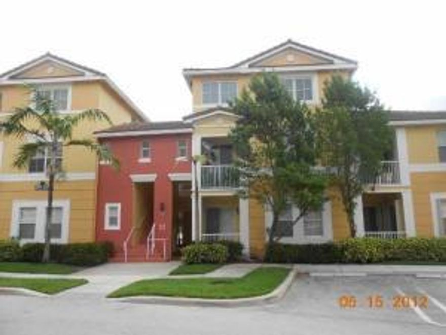 Lovely first floor Condo with 3 bedrooms and 2.5 baths. Beautiful grounds located inside gated community, walking distance to publix plaza, minutes from nearest Wellington Green Mall, community pool, and assigned and guest parking spaces.