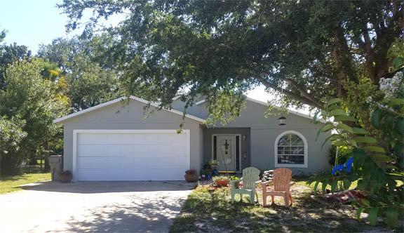 Beautifully fenced and landscaped home. County Water/Sewer. Reroof 2013. AC 2015. Island kitchen w open floor plan. Walk in closet. Part of garage used as office with A/C. Stainless range and refrigerator. 2-10 Home Warranty. All sizes are approximate.
