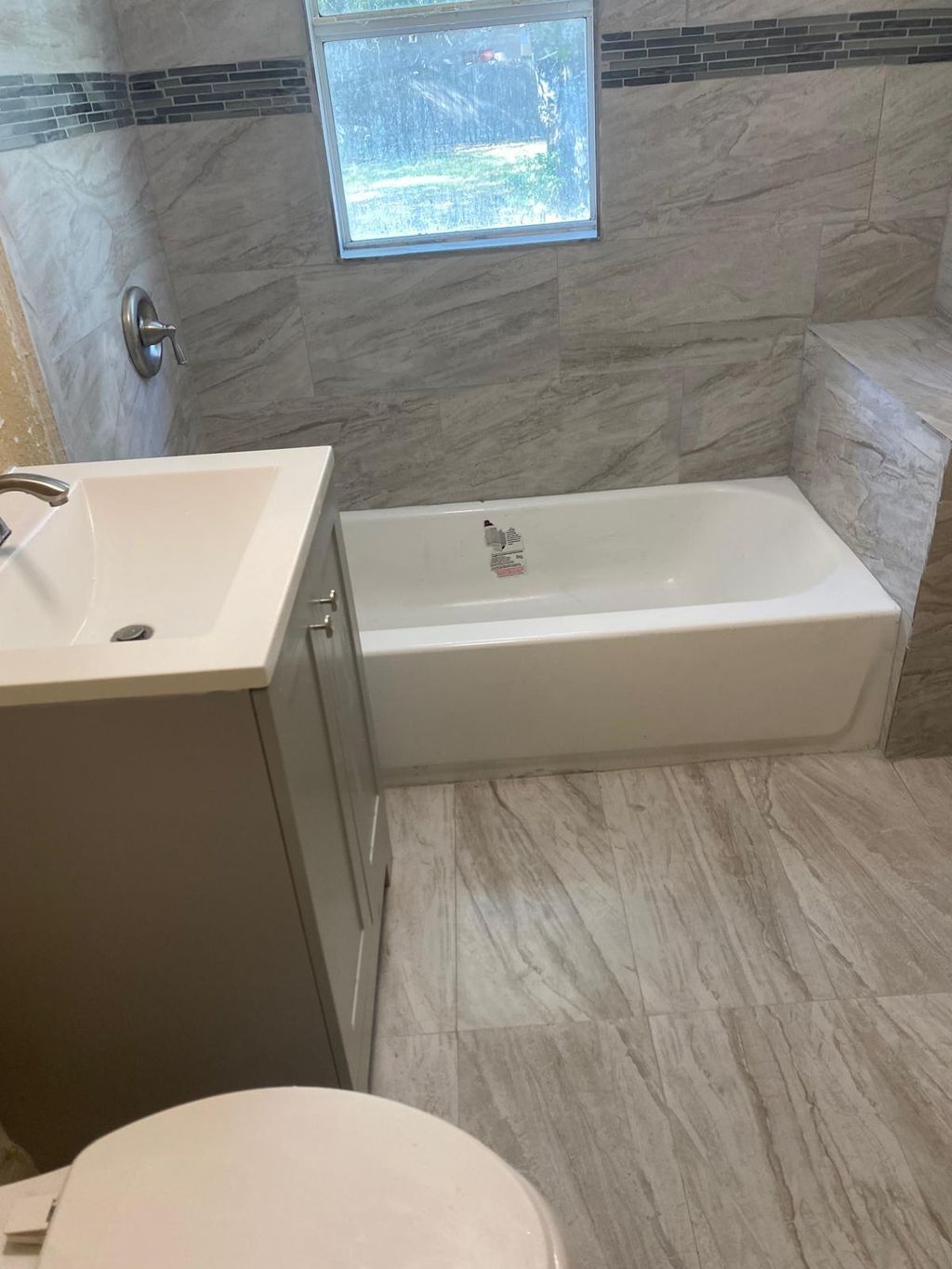 Photo of 143 N 15th Street, Fort Pierce, FL 34950 (MLS # R11161888)