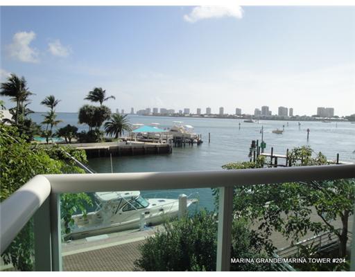 **EXTRA LARGE WATERFRONT 3 BEDROOM RENTAL. NEW HARD SURFACE FLOORING INSIDE AND ON THE BALCONY. NO CARPET. New Paint. Plus Guest Powder Room. The largest interior floor plan at Marina Grande for rent. Rent includes High Speed Internet and Basic HD Cable TV. Also includes 24 Hour Manned Gate and Valet Parking. Amenities are unequaled in Palm Beach County: Rooftop Amenities Deck with Tennis, Fitness Center, Huge Heated Pool, Hot Tub, BBQ and Picnic Area. Very Social Communities with lots of parties and activities to enjoy. Newly remodeled Club House with Catering Kitchen; Social Committee organizes the activities. Pet friendly community with Water Views! Centrally located close to Hospitals, International Airport, World Class Shopping, Restaurants, Golf and Beach.