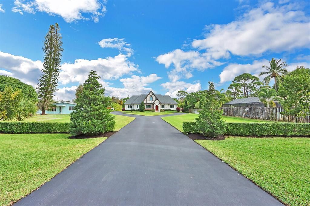 Photo of 4865 SE Manatee Cove Road, Stuart, FL 34997 (MLS # R10776081)