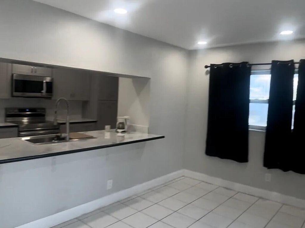 Photo of 9402 NW 81st Court, Tamarac, FL 33321 (MLS # B26003746)