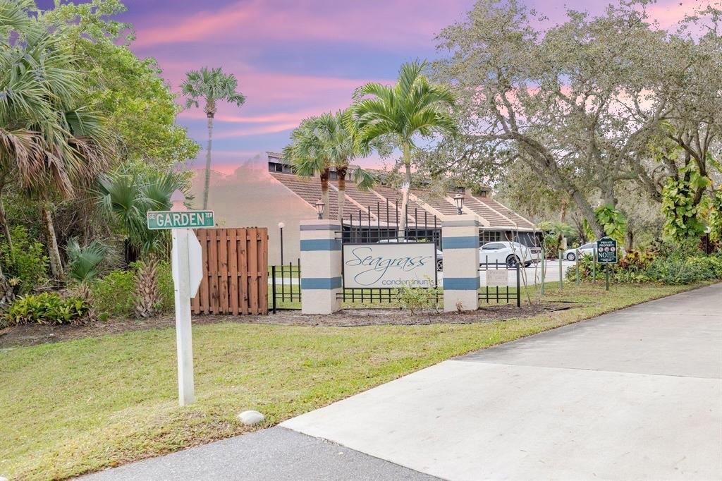Nestled in the tranquil in Port St Lucie's Seagrass Condominiums, this beautifully upgraded 2-bedroom, 2-bath ground-floor condo sits at the end of the community for added privacy and is conveniently located near the pool. Step into an open-concept kitchen and updated bathroom vanities, fresh paint throughout. Enjoy peaceful mornings or unwind on your private screened-in patio, accessible through dainty French doors from the master bedroom. This vibrant, no-age-restriction community allows immediate rentals and welcomes pets up to 20 lbs. HOA dues include access to the pool, trash pickup, common area upkeep, and exterior insurance, making Seagrass an ideal, hassle-free choice for comfortable living. Pics coming soon.