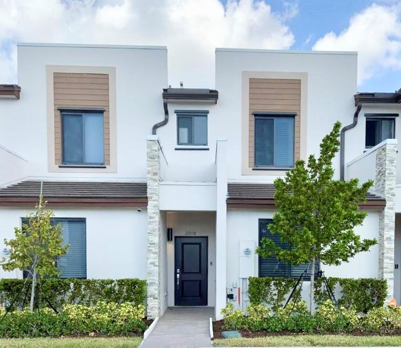 Experience modern luxury in this 3-bed, 3-bath townhouse, built 2021, w/ sleek finishes & style-perfect as a home or investment. Open floor plan seamlessly connects living room, dining and kitchen for functional living w/an upgraded, redesigned private backyard-delightful for gatherings. Downstairs also includes a versatile bedroom with a Jack-and-Jill bath and extra storage under stairs. Upstairs holds 2 bedrooms with en-suite bathrooms, the primary boasting dual sinks. A washer and dryer add convenience. Recent upgrades include a new range and fresh interior paint. Enjoy resort-style amenities, including a pool, spa, gym, kids’ playroom, and more. Excellent location! Currently rented at $3,000/month until 9/30/25, this is a fantastic turnkey opportunity in a thriving community!!!