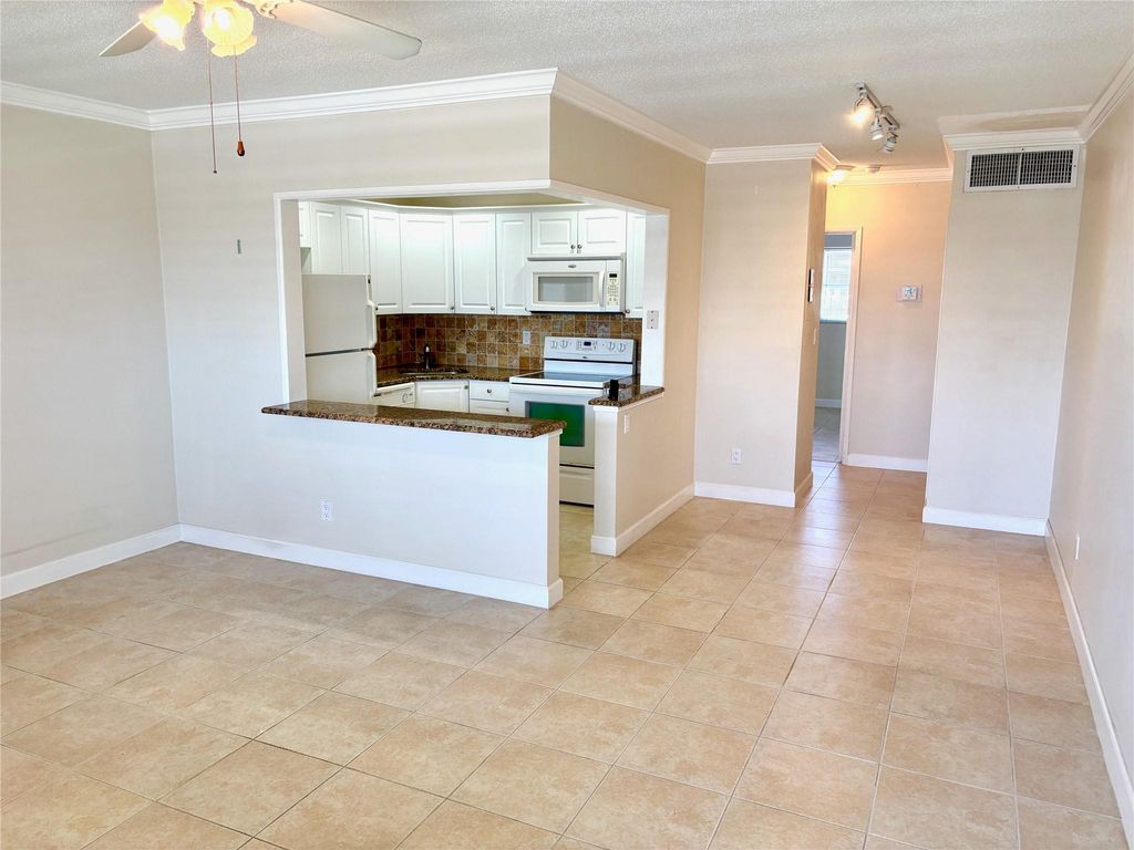 Photo of 5200 NE 24th Terrace #307C, Fort Lauderdale, FL 33308 (MLS # F10493712)