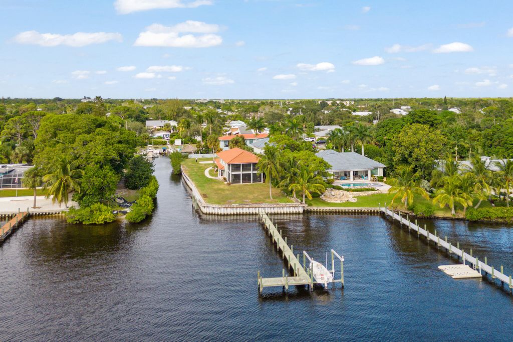 Photo of 911 NW Sunset Terrace, Stuart, FL 34994 (MLS # R10934860)