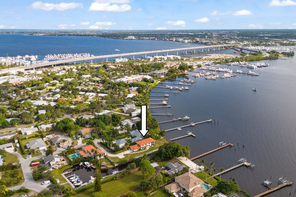 Photo of 911 NW Sunset Terrace, Stuart, FL 34994 (MLS # R10934860)
