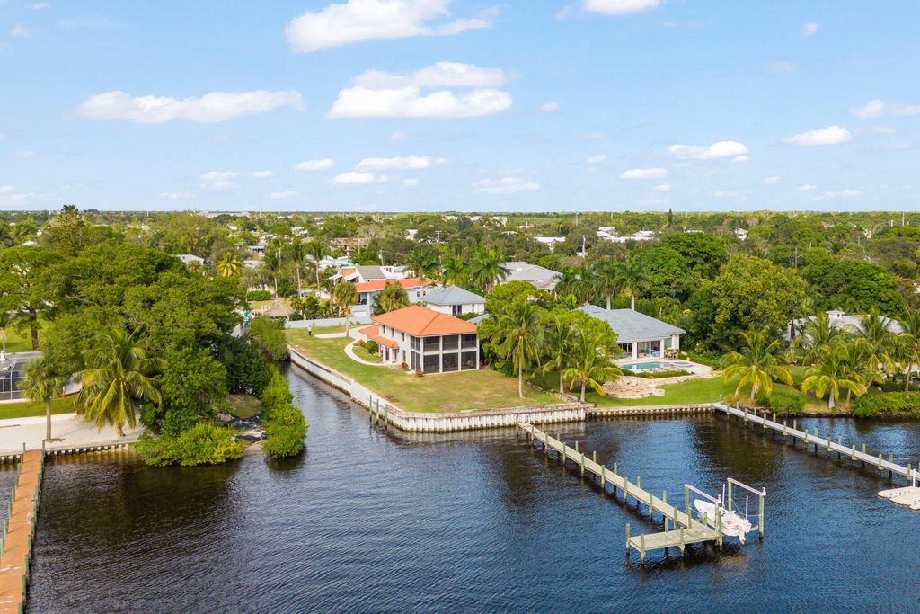 Photo of 911 NW Sunset Terrace, Stuart, FL 34994 (MLS # R10934860)