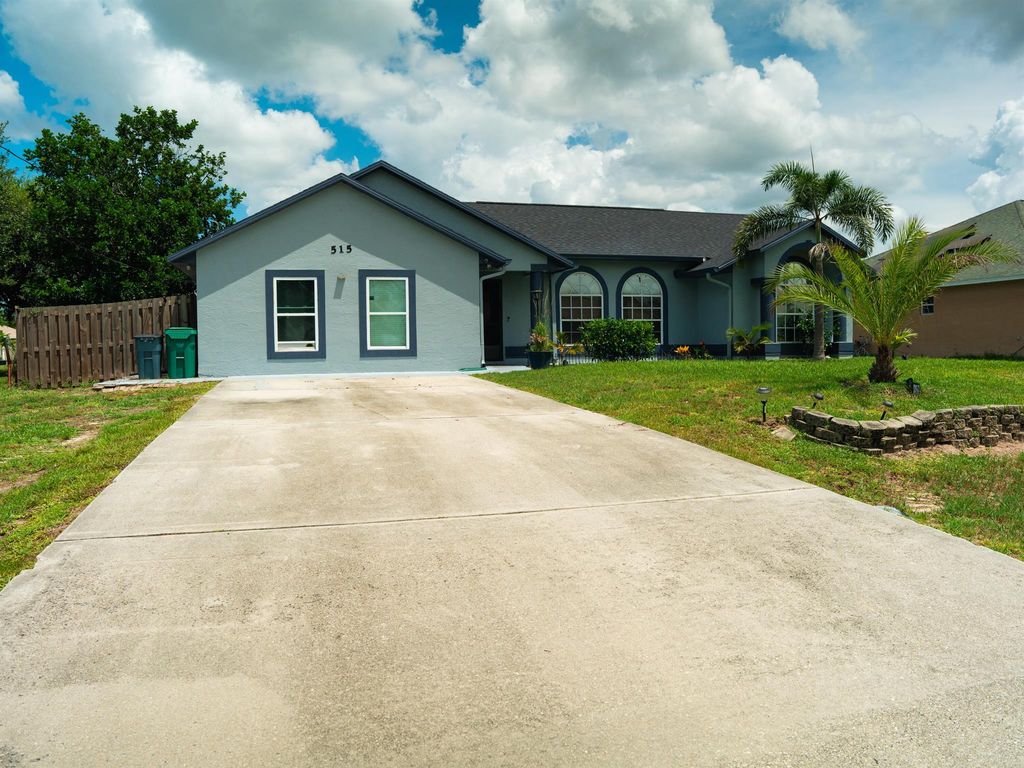 Photo of 515 SW Jeanne Avenue, Port St Lucie, FL 34953 (MLS # R10912970)