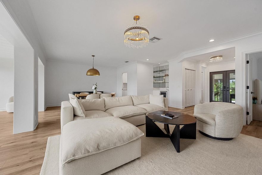 Beautifully renovated 3BR/3BA golf cottage in the iconic Palm Beach Polo & Country Club. Residence A203 offers over 2,000 sq ft of stylish living with a modern kitchen, wide-plank oak flooring, custom bar, and expansive great room. The serene master suite features a luxe soaking tub, quartz finishes, and a custom walk-in closet. Enjoy indoor-outdoor living with a bright lanai and breakfast nook now part of the interior. Steps from the wellness center, pool, clubhouse, gourmet market, and minutes to dining, Whole Foods, and world-class equestrian venues. A perfect Wellington retreat for season!