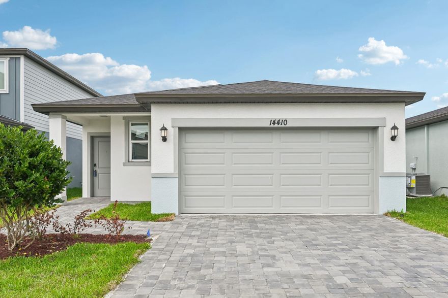 Upgrades include all appliances, window blinds, smart home technology, and quartz countertops! 1,513 sq. ft. with 3 bedrooms, 2 bathrooms, and a bright, open-concept layout. The modern kitchen includes stainless steel appliances and a spacious island, perfect for entertaining. Enjoy a patio and energy-efficient features throughout. Terra Lago offers resort-style amenities like a clubhouse, pool, and walking trails. With convenient access to both Martin and Palm Beach County, this new community blends small-town charm with modern living.