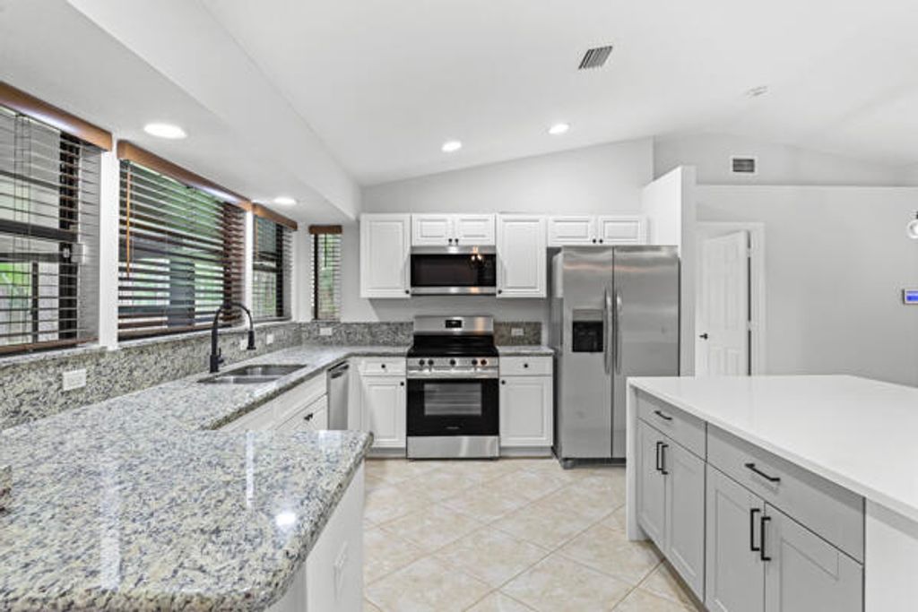 Photo of 11850 60th Street N, Royal Palm Beach, FL 33411 (MLS # R11018294)