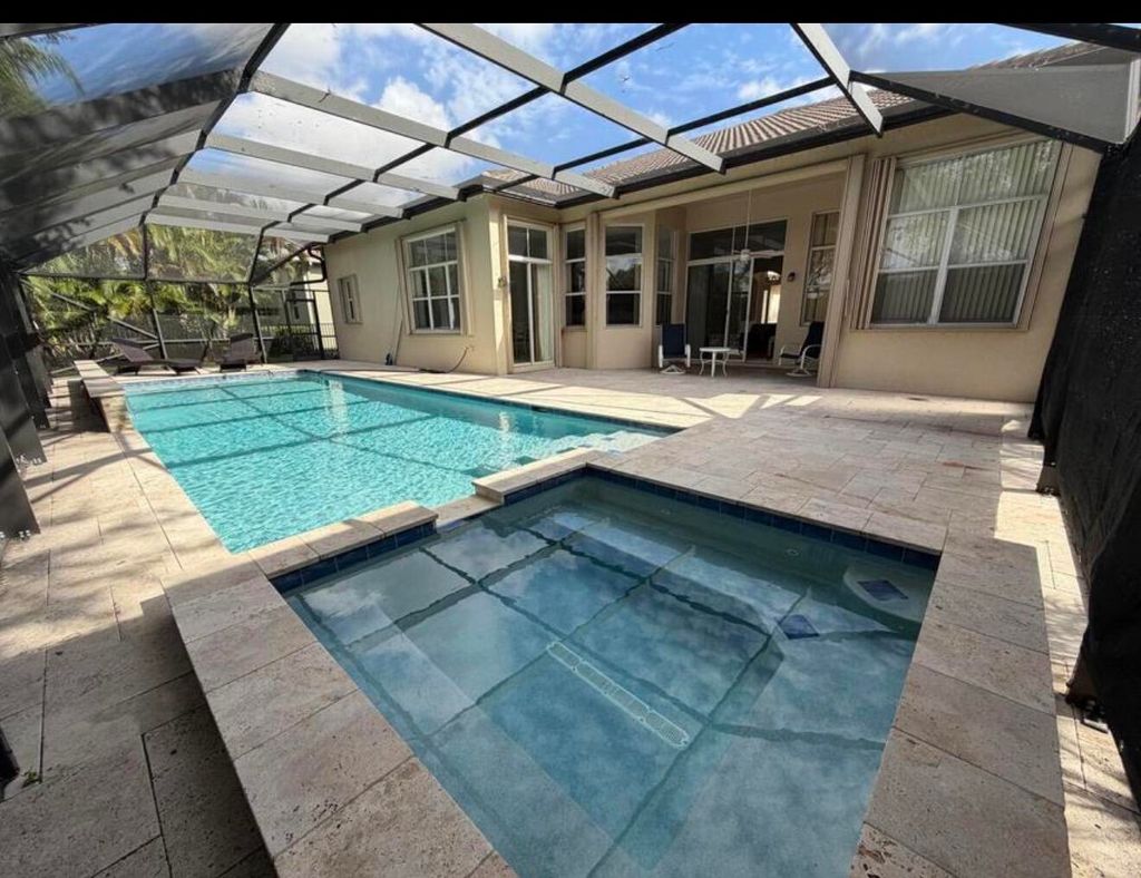 Photo of 10440 Cypress Lakes Preserve Drive #Na, Lake Worth, FL 33449 (MLS # B26044820)