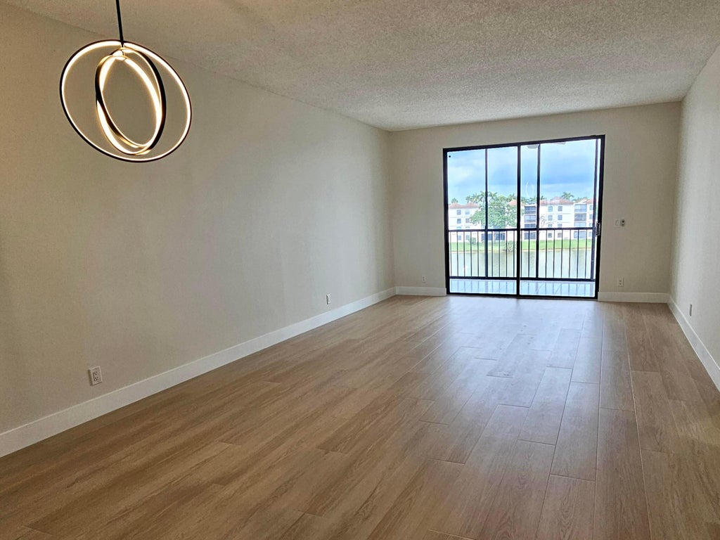 Photo of 6193 Pointe Regal Circle #408, Delray Beach, FL 33484 (MLS # R10969467)