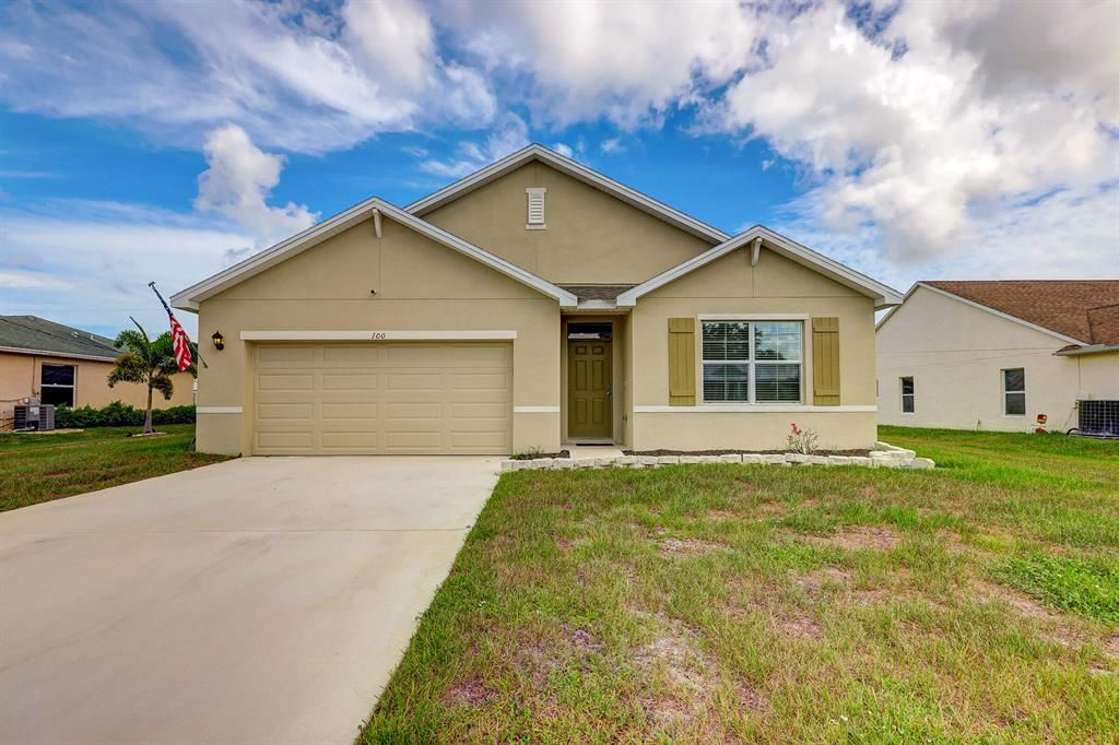 Photo of 1007 SW Estaugh Avenue Ave, Port St Lucie, FL 34953 (MLS # R10821854)