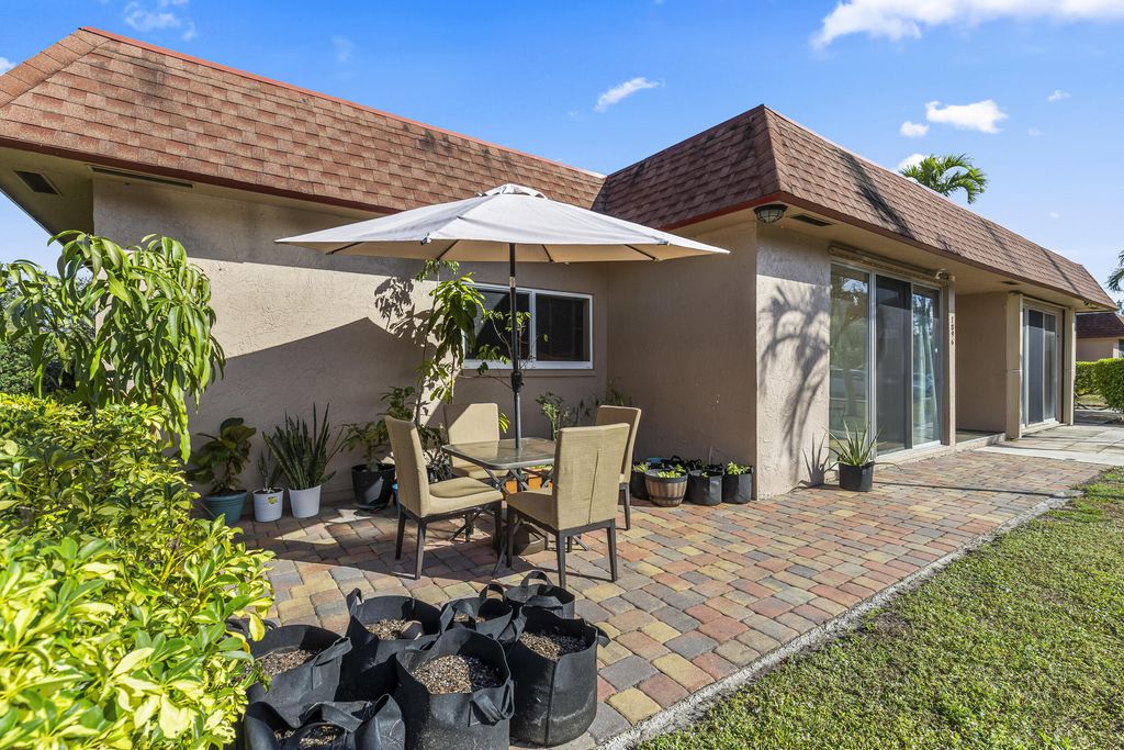 Photo of 1896 Palmland Drive #A, Boynton Beach, FL 33436 (MLS # R11065863)