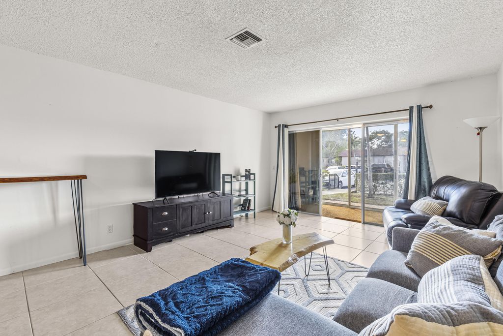 Photo of 1896 Palmland Drive #A, Boynton Beach, FL 33436 (MLS # R11065863)