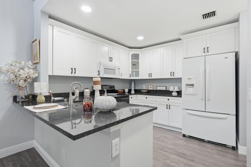Photo of 2985 GENOA Place #2985, West Palm Beach, FL 33406 (MLS # B26070055)