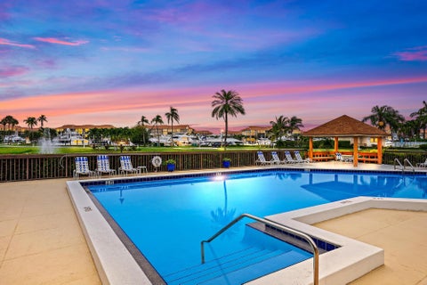 Photo of 601 SEAFARER Circle #201, Jupiter, FL 33477 (MLS # B26085047)