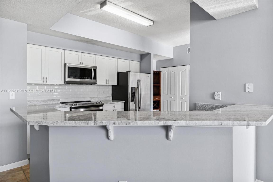 SOMERSET AT ABACOA CONDO - Residential Lease