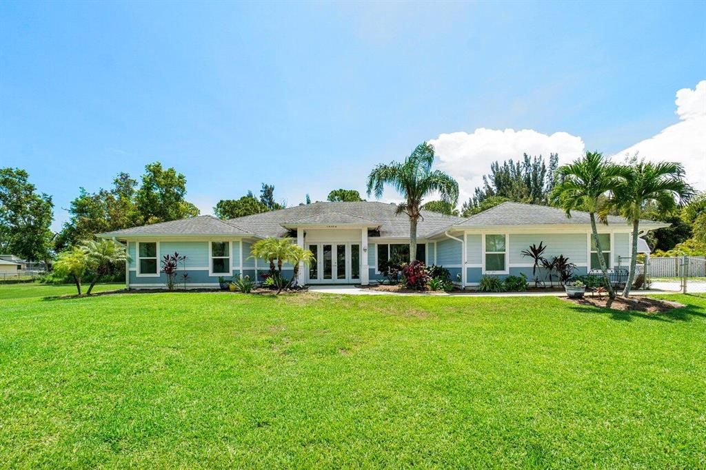 Photo of 14182 64th Drive Dr N, Palm Beach Gardens, FL 33418 (MLS # R10802968)