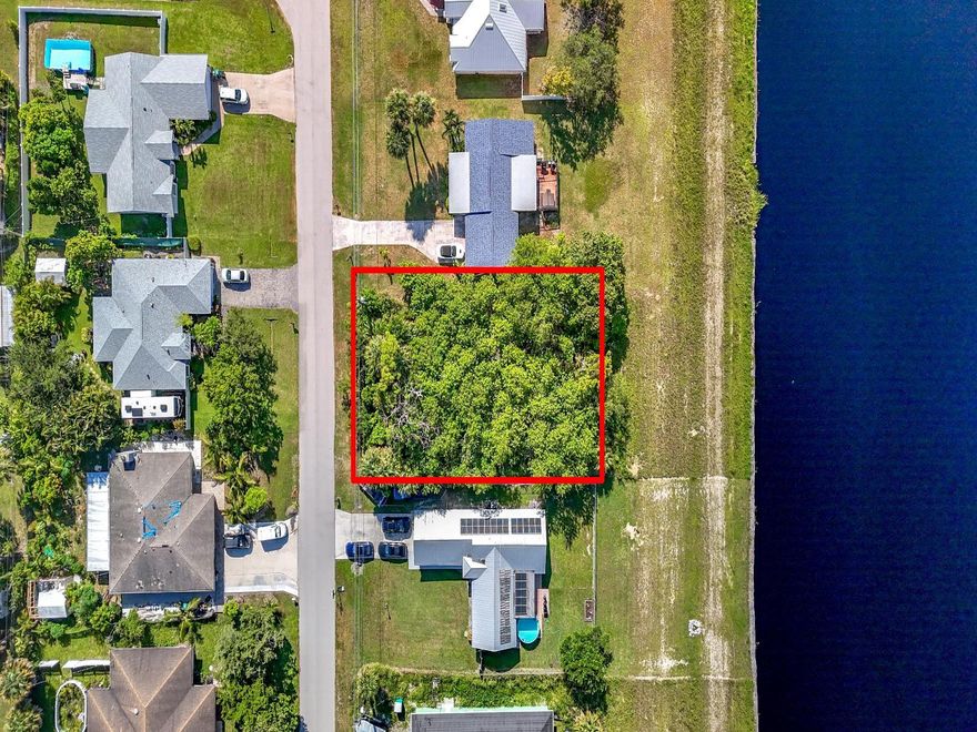 Priced to Sell!  Builders & Investors alike will see the potential in this spacious 125’x80’ lot.  Great location with freedom to build - in a boat and RV-friendly area with No HOA!  The Large C-24 canal is 160 feet wide, offering the ideal location to enjoy fishing, kayaking, jet skiing, stand up paddle boarding and unforgettable sunset views. This rare opportunity is located in one of Florida’s most charming and vibrant beach towns-Port St. Lucie’s famous laid-back lifestyle is ideal for anyone planning to build your primary residence, a vacation home, or a smart long-term investment. Don’t miss this opportunity to turn your dream into a reality. Please allow up to 72 hours for a response. DO NOT SUBMIT OFFERS SIGHT UNSEEN.