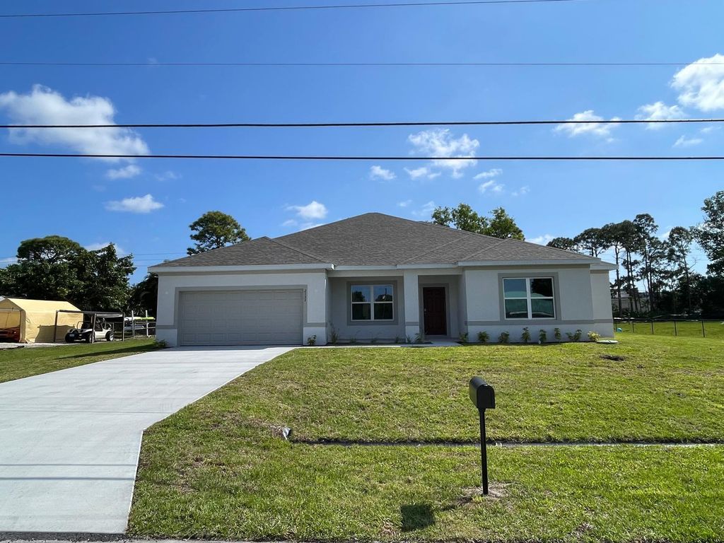Photo of 2133 SE Flanders Road, Port Saint Lucie, FL 34952 (MLS # R11081408)