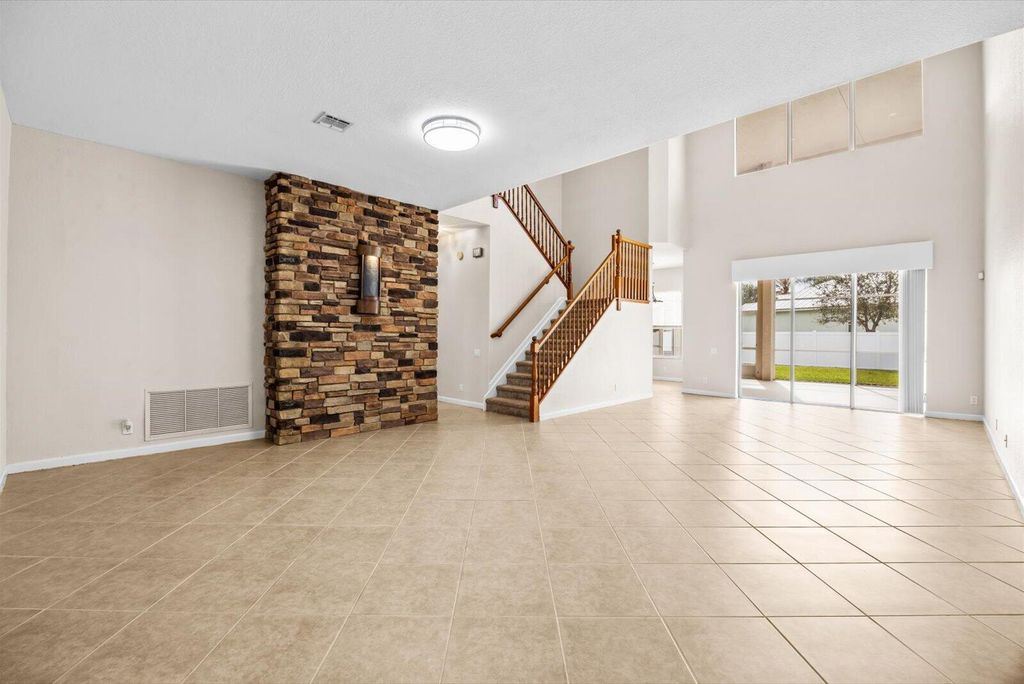 Photo of 206 NW Magnolia Lakes Boulevard, Port Saint Lucie, FL 34986 (MLS # R11167810)