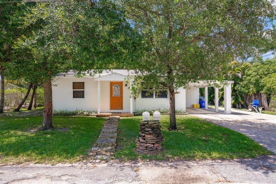 This is truly a unique property with just about a quarter acre of private front and back yard exposure. Florida's tropical refreshing breezes brushing this home under tons of shady palm trees. Enjoy a feeling of being at the beach and not so far from the beach. The city of Lake Worth has official upgraded their name to Lake Worth Beach and this home explains exactly why. Welcome to this beautiful 2 BEDROOM 1 BATH HOUSE WITH SEPARATE 1 BEDROOM APT ON LG LOT NICELY LANDSCAPED IN QUIET RESIDENTIAL NEIGHBORHOOD