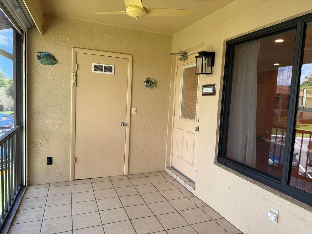 Photo of 229 Pine Hov Circle #A-2, Greenacres, FL 33463 (MLS # R11120804)