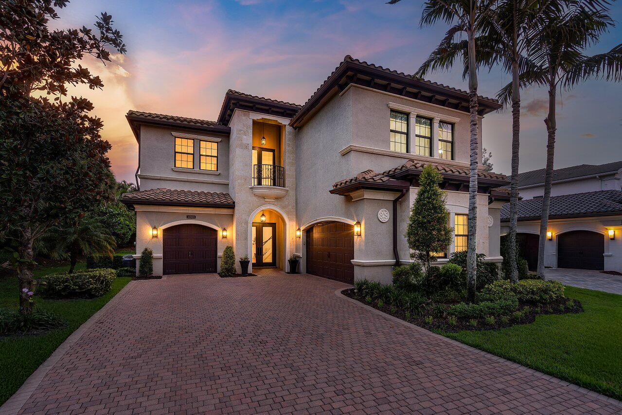Welcome to your dream home in the prestigious Seven Bridges community, where elegance and resort-style living unite. Tucked away on a tranquil cul-de-sac, this exquisite Vizcaya model is set on a sought-after private lot, surrounded by lush landscaping, a secluded back and side yard, and exceptional privacy. Offering 5 bedrooms and 51/2 baths, all graciously proportioned, this home blends sophisticated design with everyday comfort. Step through the double glass doors into a soaring two-story entry, crowned by a dramatic turned staircase. The grand foyer flows into a formal living room with a breathtaking double-volume ceiling, while the formal dining room is framed by a coffered ceiling and transom window, setting the stage for memorable gatherings. New flooring underfoot adds a fresh,