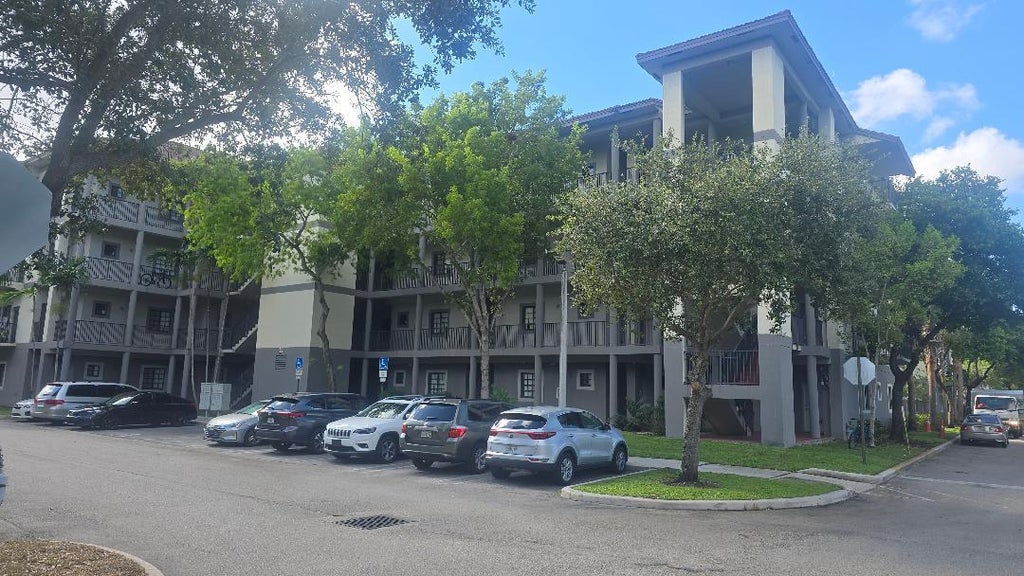 Photo of 2851 RIVERSIDE Drive #308-N, Coral Springs, FL 33065 (MLS # B26062482)