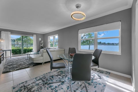 Photo of 960 Crystal Lake Drive #115, Deerfield Beach, FL 33064 (MLS # R11159578)