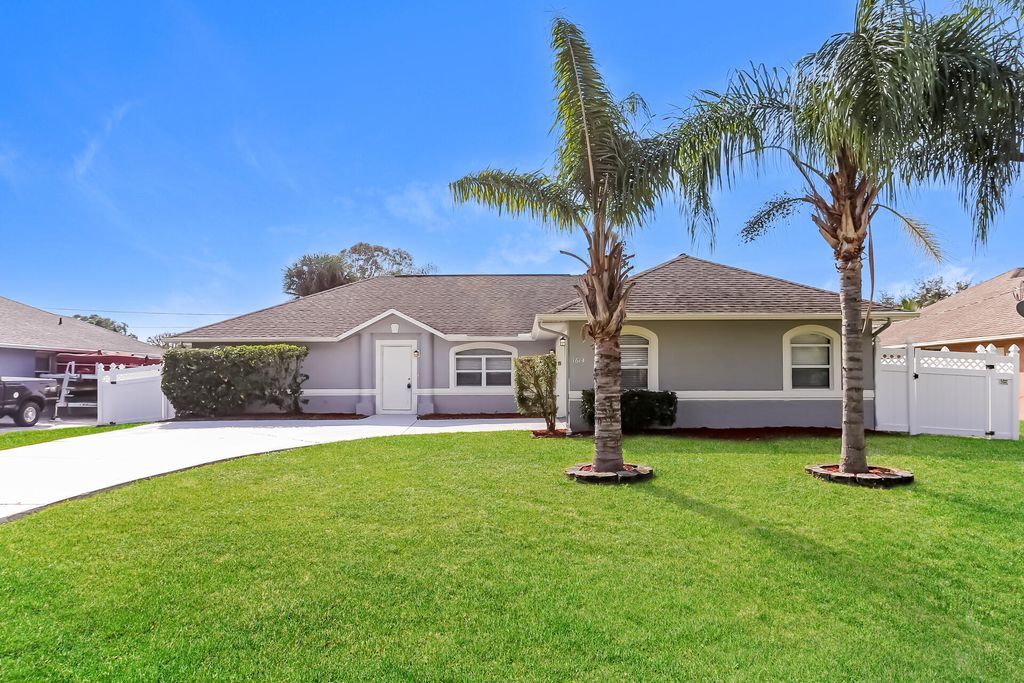 Photo of 1614 SE Goucho Avenue, Port Saint Lucie, FL 34952 (MLS # R11163087)
