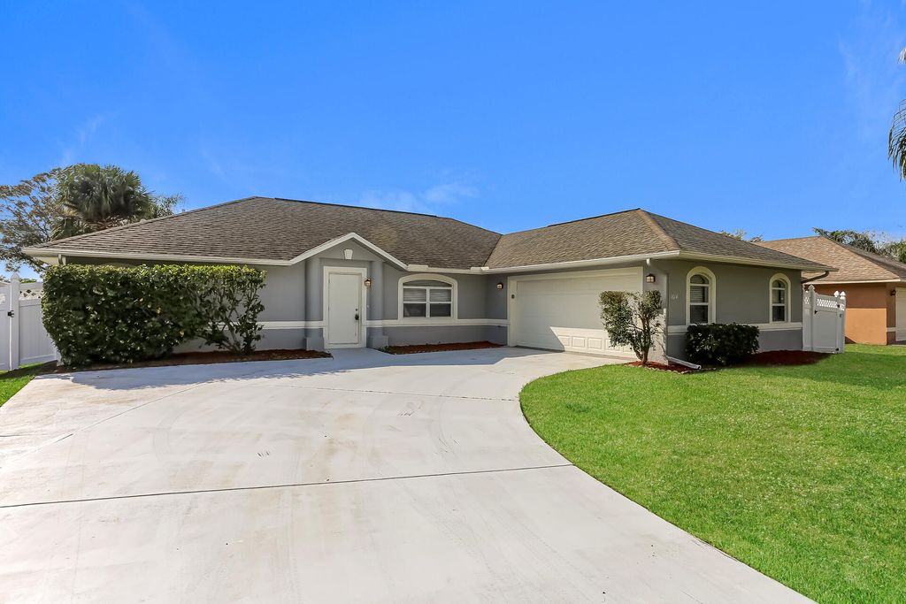 Photo of 1614 SE Goucho Avenue, Port Saint Lucie, FL 34952 (MLS # R11163087)