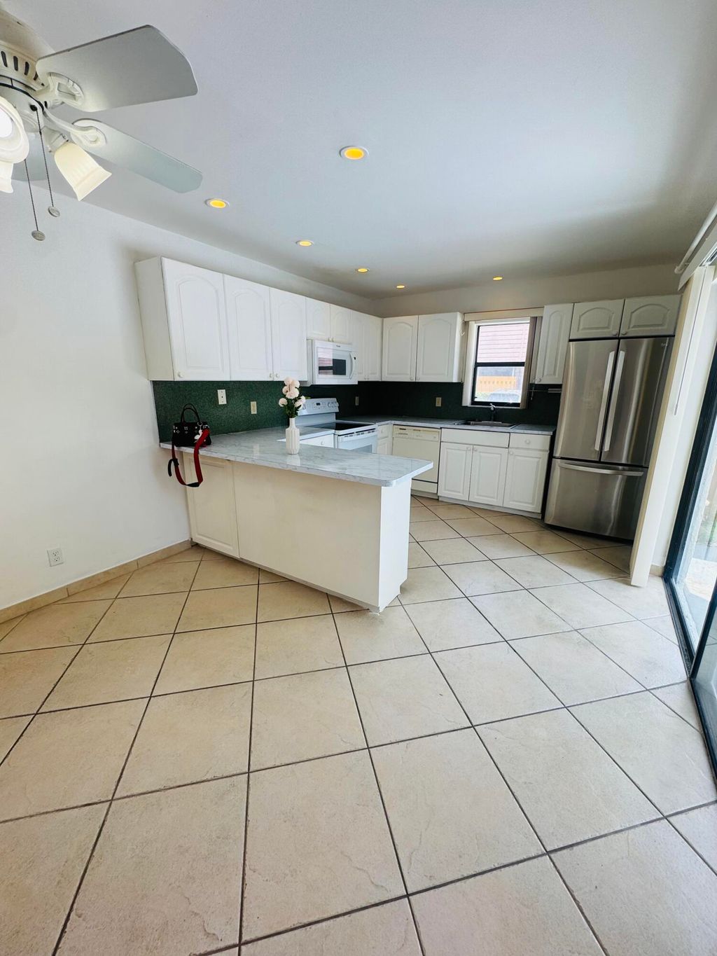 Photo of 7582 Courtyard Run E #7582, Boca Raton, FL 33433 (MLS # B26017935)