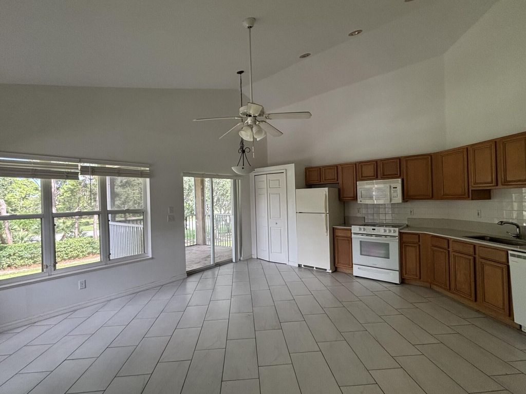 Photo of 9878 Perfect Drive #30, Port Saint Lucie, FL 34986 (MLS # R11026196)
