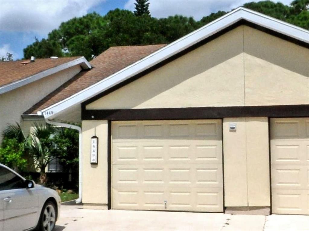 Photo of 1449 SE Rivergreen Circle, Port Saint Lucie, FL 34952 (MLS # R10740414)