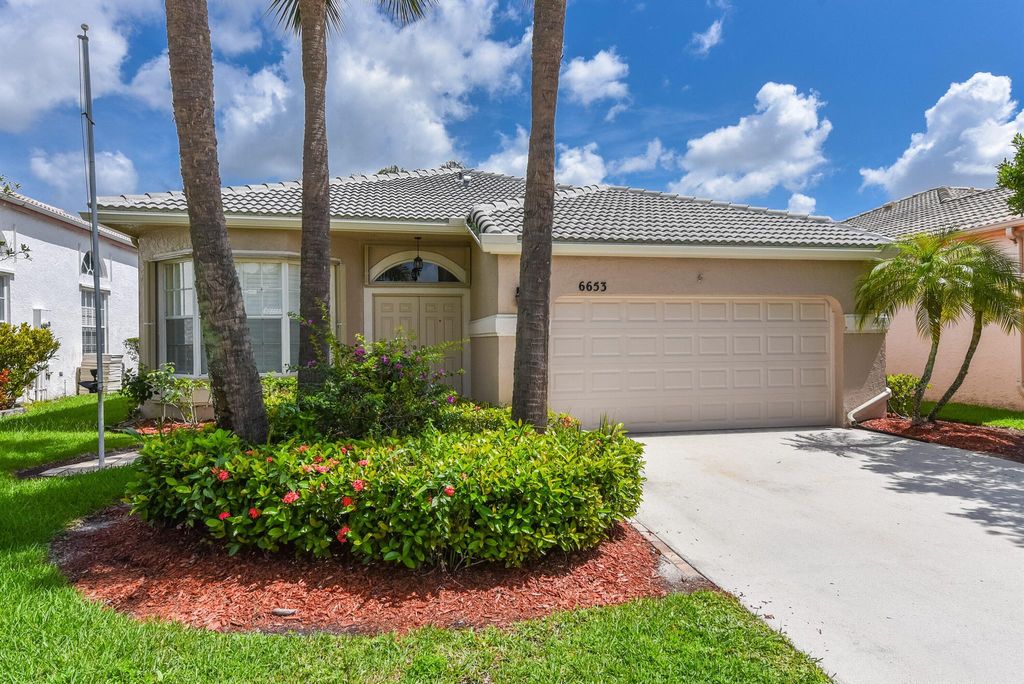 Photo of 6653 Ashburn Road, Lake Worth Beach, FL 33467 (MLS # R10903618)