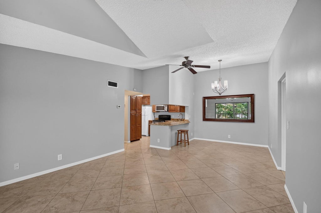Photo of 812 SKY PINE Way #A3, Greenacres, FL 33415 (MLS # B26070583)